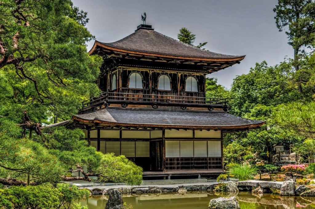 Explore the serene beauty of Ginkaku-ji Temple's Zen garden in Kyoto, Japan.